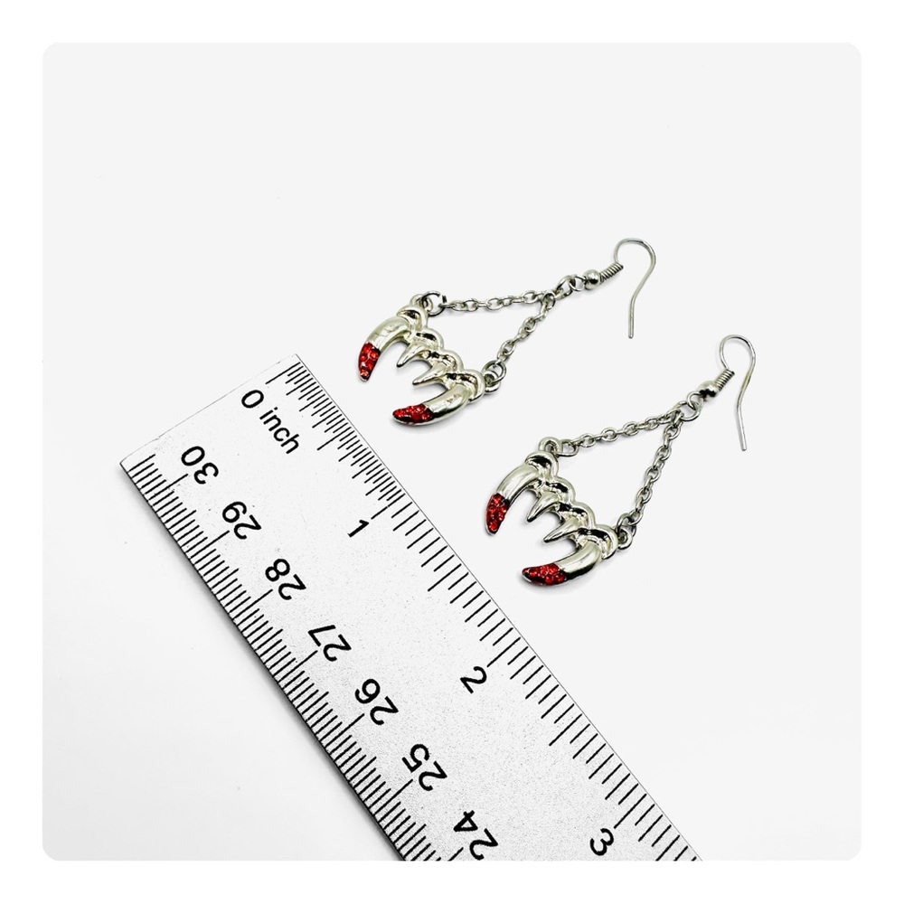 β
Vintage Y2K Vampire Fangs Dangling Earrings - Silver/Red β
- Picture 13 of 15